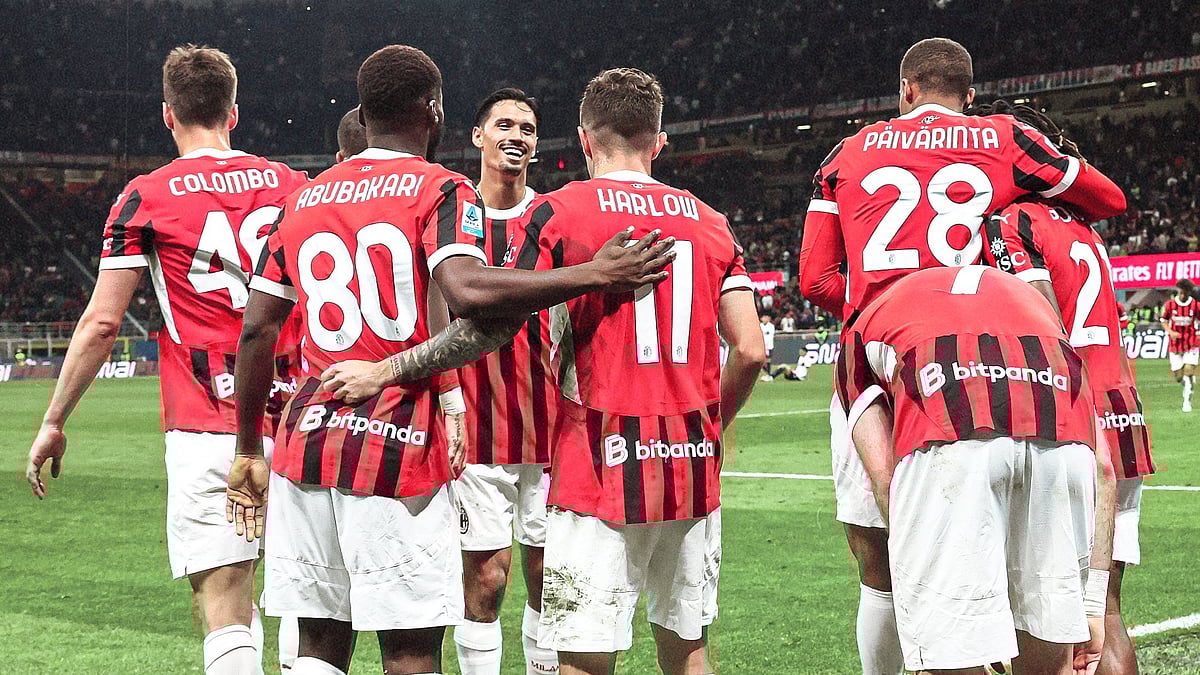 | Photo: X/acmilan : AC Milan players celebrate after scoring a goal against Bologna in Serie A.