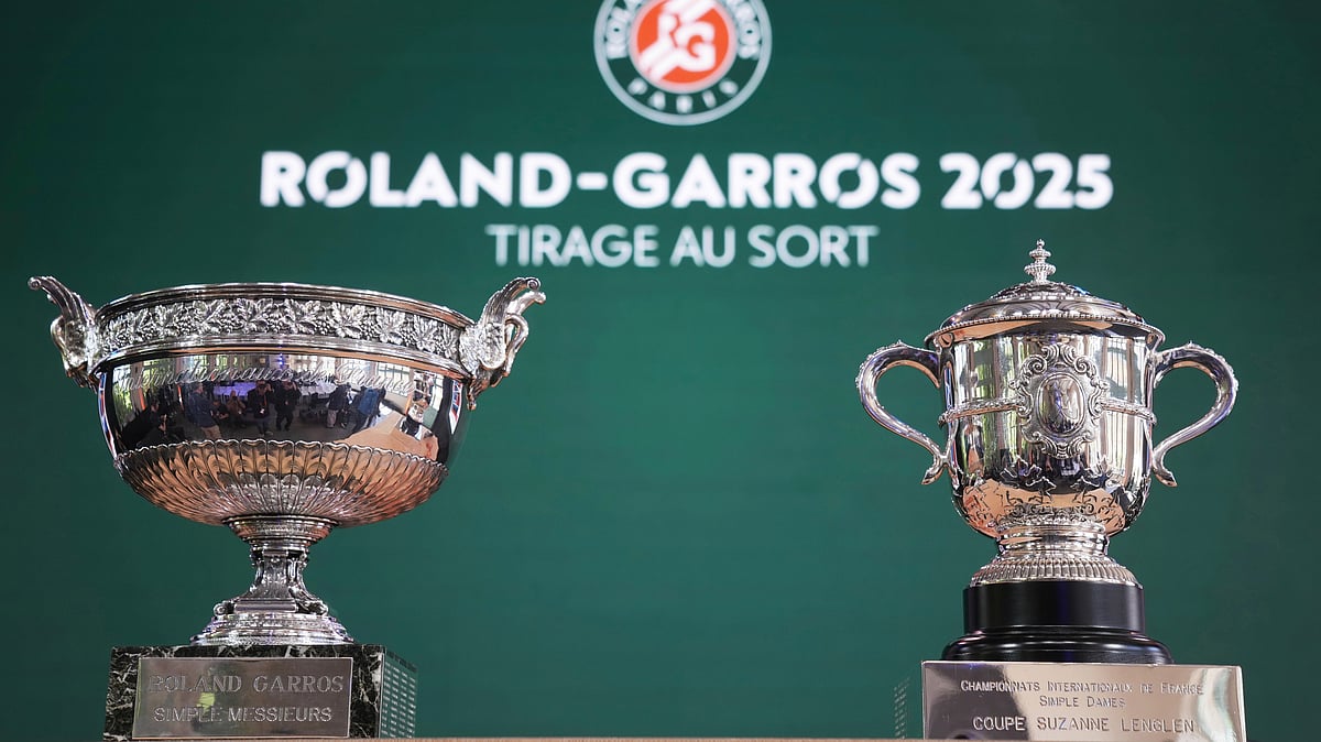 The men's, left, and women's trophies are displayed during the draw of French Open tennis tournament, Thursday, May 22, 2025 at the Roland Garros stadium in Paris. 