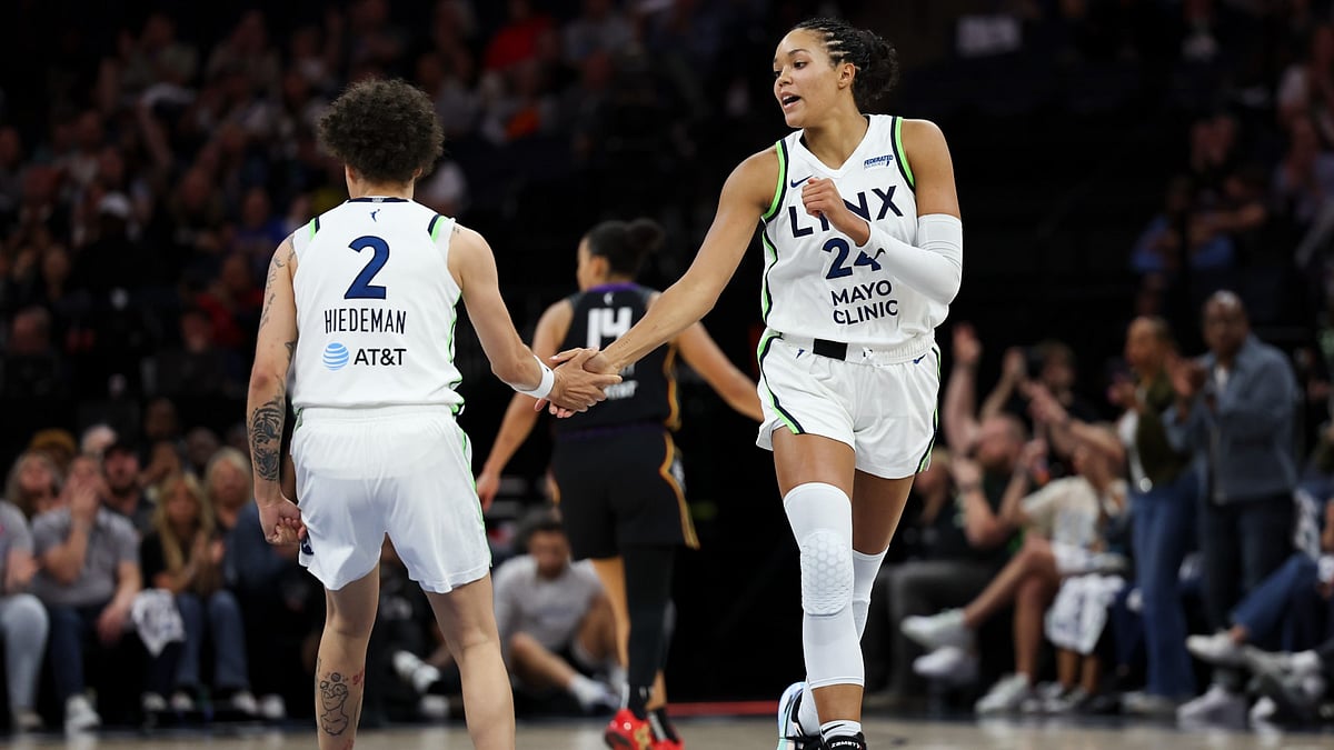 Natisha Hiedeman and Napheesa Collierr.