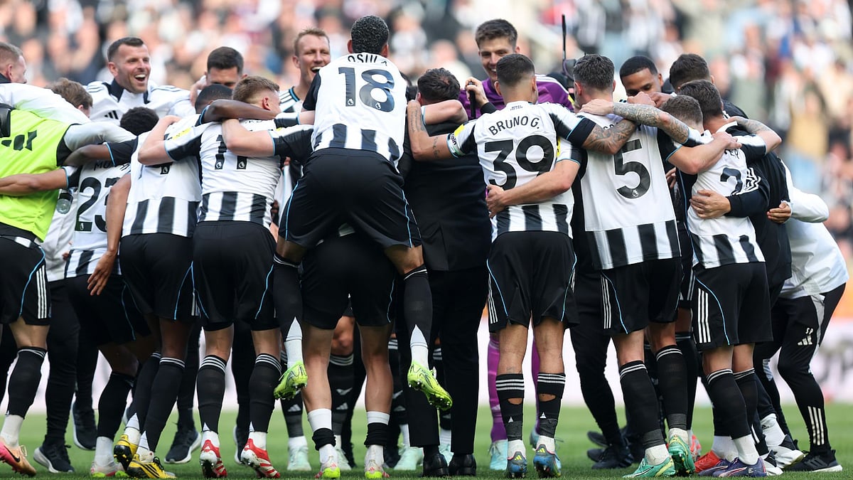 Newcastle celebrate after their Champions League qualification is confirmed