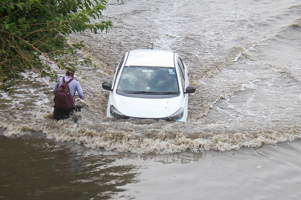 | Photo: PTI : Weather: Rain in Gurugram