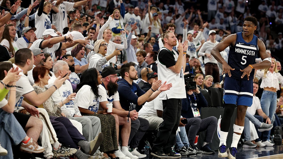 Anthony Edwards #5 of the Minnesota Timberwolves celebrates after a basket against the Oklahoma City Thunder during the third quarter in Game Three of the Western Conference Finals of the 2025 NBA Playoffs at Target Center on May 24, 2025 in Minneapolis, Minnesota.