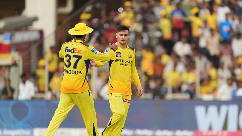 Chennai Super Kings Noor Ahmad, right, celebrates the wicket. AP