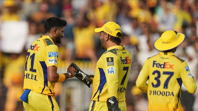 Chennai Super Kings Khaleel Ahmed, left, celebrates the wicket. AP
