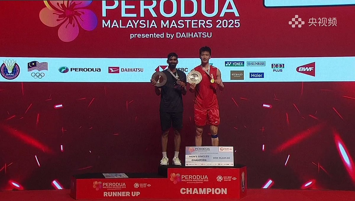 X/BadmintonJust : Kidambi Srikanth with runners-up medal at the podium.