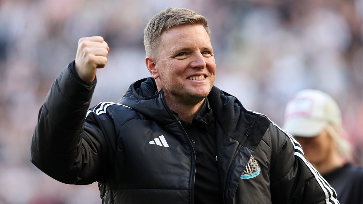 Eddie Howe celebrates achieving Champions League football in front of a jubilant St James' Park.