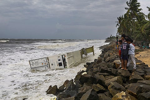 Containers drift ashore from sunken ship
