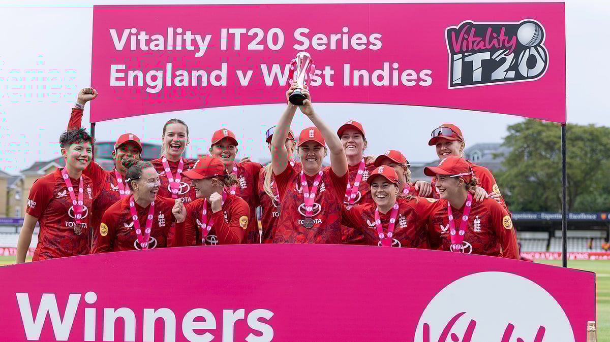 X/England Cricket : England women's cricket team celebrate with the trophy after winning the T20I series 3-0 against West Indies.