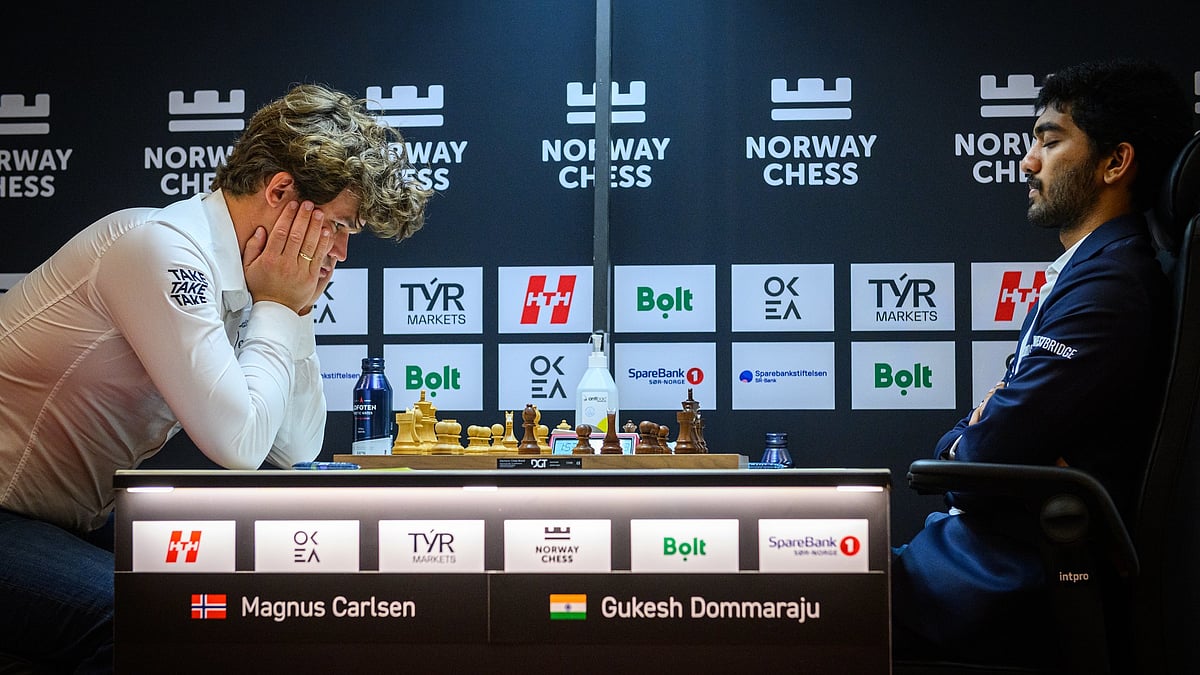 | Photo: Norway Chess/Michal Walusza : Magnus Carlsen and D Gukesh during their opening game in Norway Chess 2025.