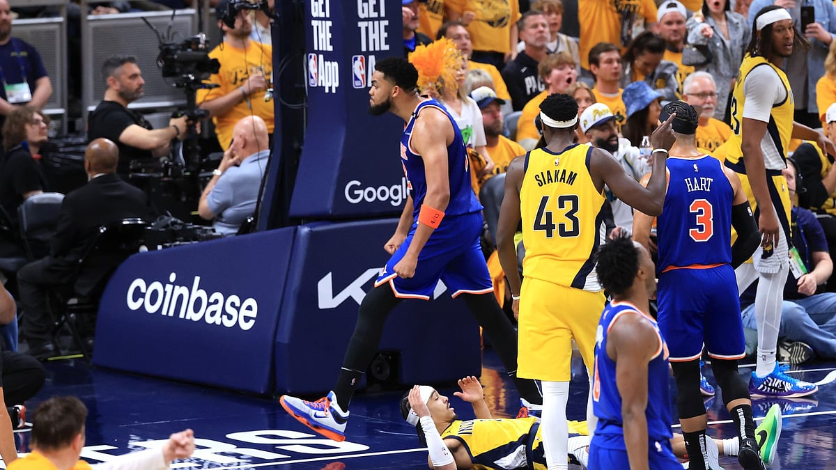 New York Knicks forward Karl-Anthony Towns reacts after a dunk in Game 3 of the 2025 Eastern Conference Finals. - null
