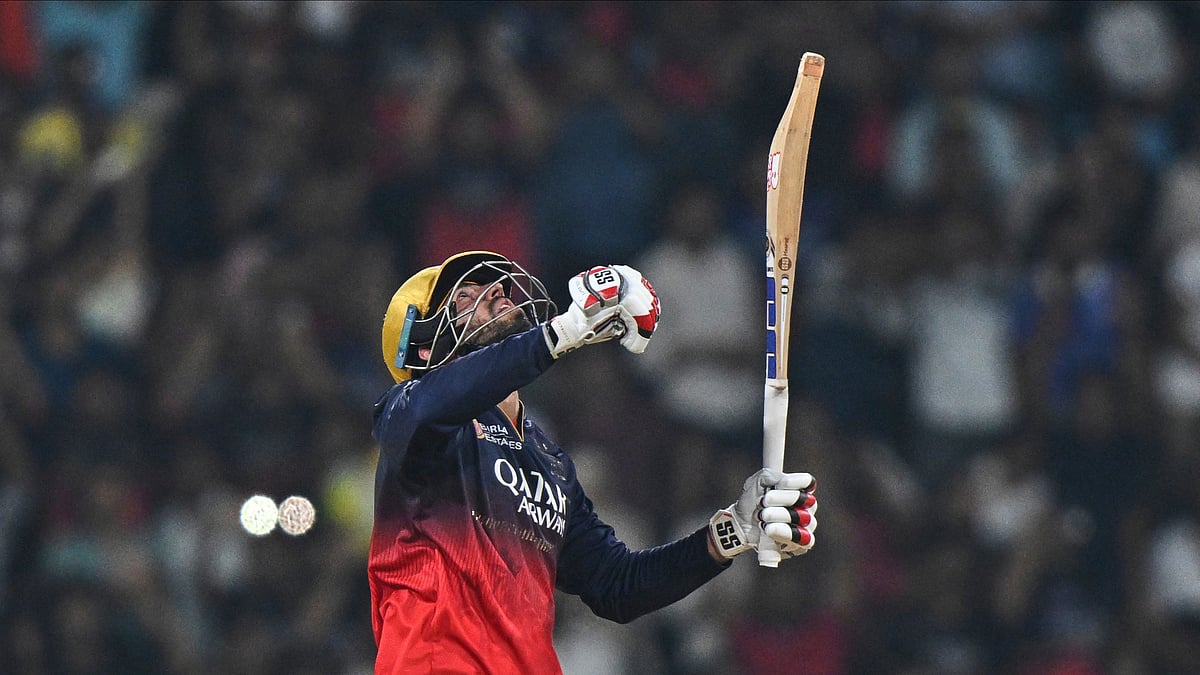 (AP Photo)
 : Royal Challengers Bengaluru's Jitesh Sharma celebrates after scoring fifty runs during the Indian Premier League cricket match between Lucknow Super Giants and Royal Challengers Bengaluru at Atal Bihari Vajpayee Ekana Cricket Stadium in Lucknow, India, Tuesday, May 27, 2025. 

