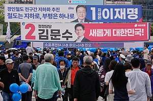 - : Banners featuring South Korea's Democratic Party's presidential election candidate Lee Jae-myung, top, and People Power Party's presidential candidate Kim Moon Soo hang at a street in Incheon, South Korea, Wednesday, May 21, 2025.