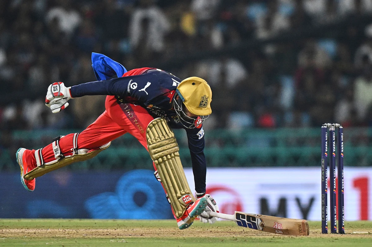Royal Challengers Bengaluru's Jitesh Sharma successfully completes a run during the Indian Premier League cricket match between Lucknow Super Giants and Royal Challengers Bengaluru at Atal Bihari Vajpayee Ekana Cricket Stadium in Lucknow, India, Tuesday, May 27, 2025. 

