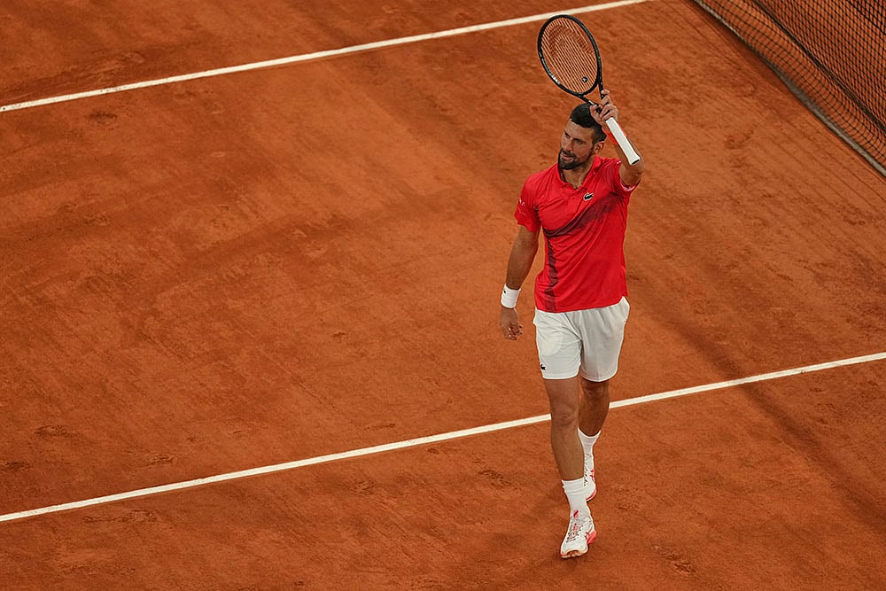 | Photo: AP/Thibault Camus : French Open Tennis: Novak Djokovic vs Mackie McDonald