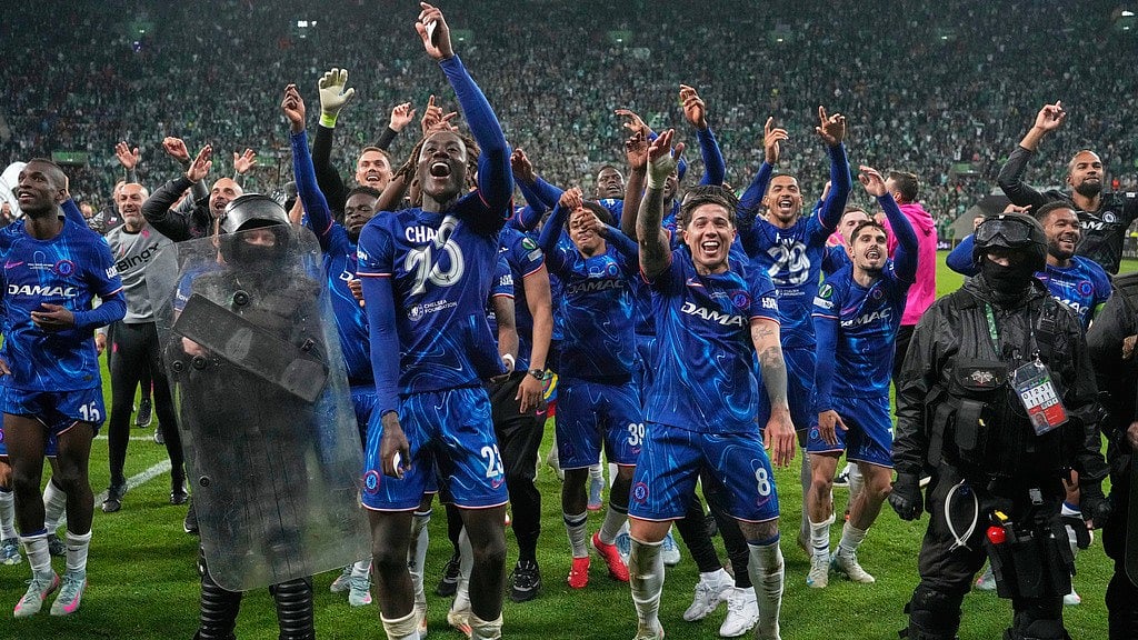 Photo: AP : Chelsea's players celebrates after winning the Europa Conference League final against Real Betis in Wroclaw, Poland.
