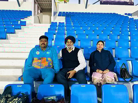 Samardeep Gill’s coach, K Sandeep Singh (left), father, Mahendra Singh Gill (middle), and mother, Manjeet Kaur.
