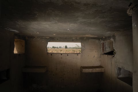 Constricted View: View from a bunker overlooking a farm
in Punjab