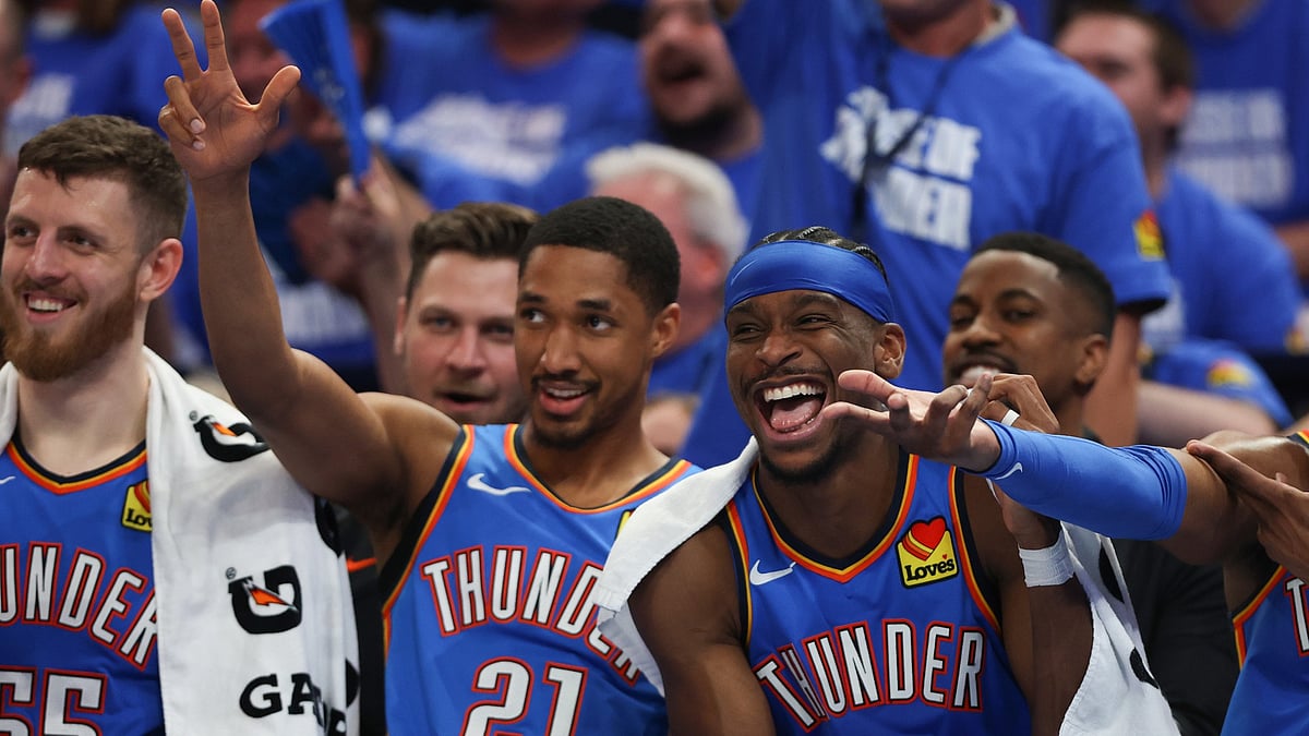 Aaron Wiggins #21 and Shai Gilgeous-Alexander #2 of the Oklahoma City Thunder react on the bench against the Minnesota Timberwolves during the fourth quarter in Game Five of the Western Conference Finals of the 2025 NBA Playoffs at Paycom Center on May 28, 2025 in Oklahoma City, Oklahoma.