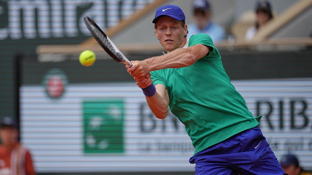 Photo: AP : Italy's Jannik Sinner returns the ball to France's Richard Gasquet during their second-round match of French Open 2025 at the Roland Garros stadium in Paris.