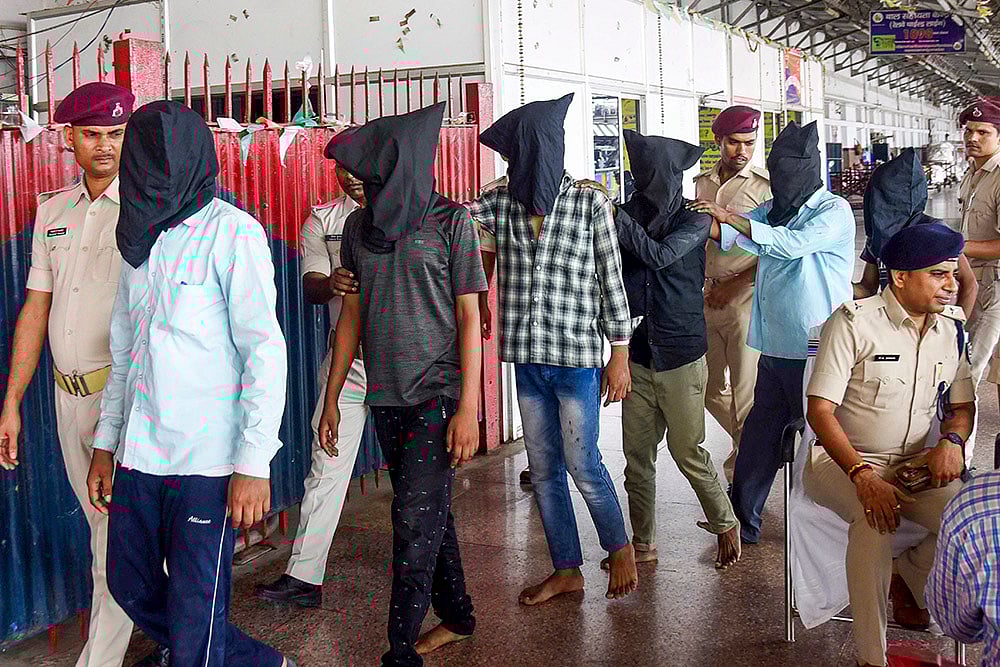 | Photo: PTI : Train robbers arrested in Patna