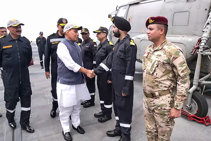 Rajnath Singh meets naval officers aboard INS Vikrant