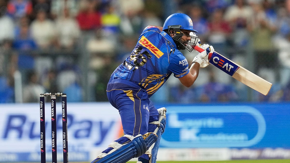 (AP Photo/Rajanish Kakade) : Mumbai Indians' Rohit Sharma plays a shot during the Indian Premier League cricket match between Mumbai Indians and Delhi Capitals at Wankhede Stadium in Mumbai, India, Wednesday, May 21, 2025. 