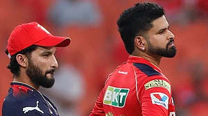 | Photo: AP : Punjab Kings' captain Shreyas Iyer and Royal Challengers Bengaluru's captain Rajat Patidar during the coin toss before IPL 2025 Qualifier 1.