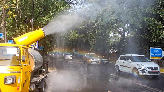 PTI : An anti-smog gun spewing water droplets to trap pollutants