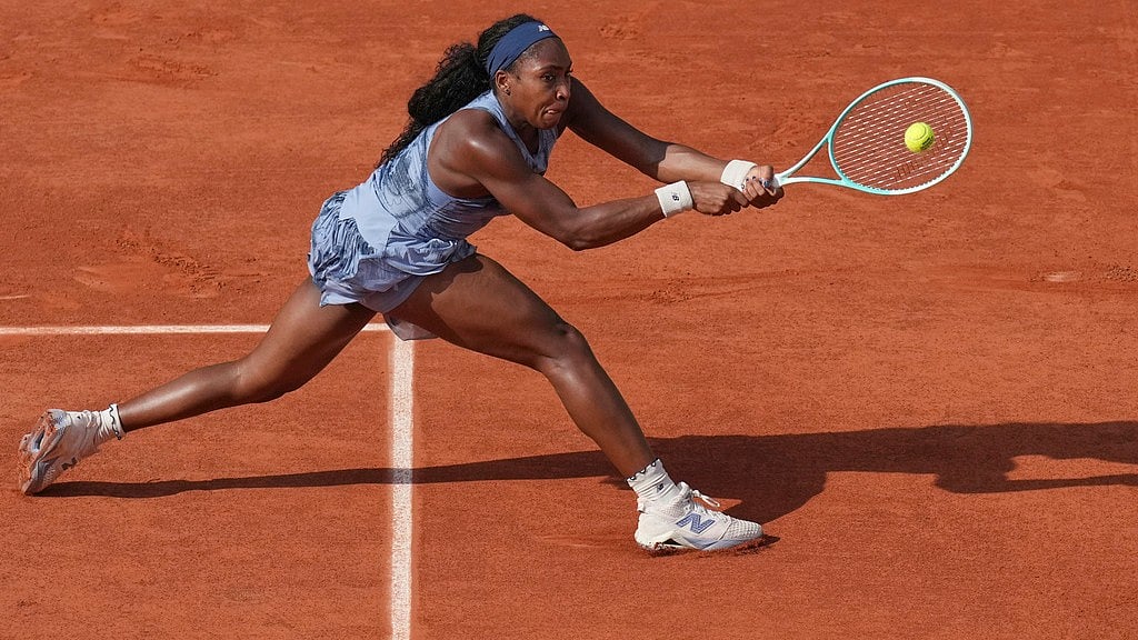 Photo: AP : Coco Gauff of the United States returns the ball to Marie Bouzkova of the Czech Republic during their third round match of the French Open, at the Roland-Garros stadium in Paris.