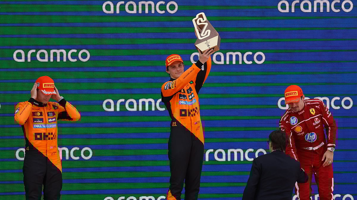 (AP Photo/Joan Monfort)


 : McLaren driver Oscar Piastri of Australia, centre, celebrates after winning the Spanish Grand Prix Formula One race at the Barcelona Catalunya racetrack in Montmelo, near Barcelona, Spain, Sunday, June 1, 2025. 