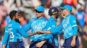(AP Photo/ Ajit Solanki ) : England's Adil Rashid, left, celebrates the wicket of India's Hardik Pandya with his team mates during the third one day international cricket match between India and England in Ahmedabad , India, Wednesday, Feb. 12, 2025.