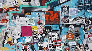 Shutterstock : There are different reasons behind the existence of slap stickers. Besides reclaiming the streets and promoting various businesses, they often run commentaries on political issues plaguing the cities they are found in