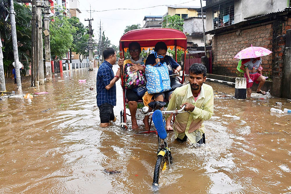 | Photo: PTI : Weather: Floods in Guwahati