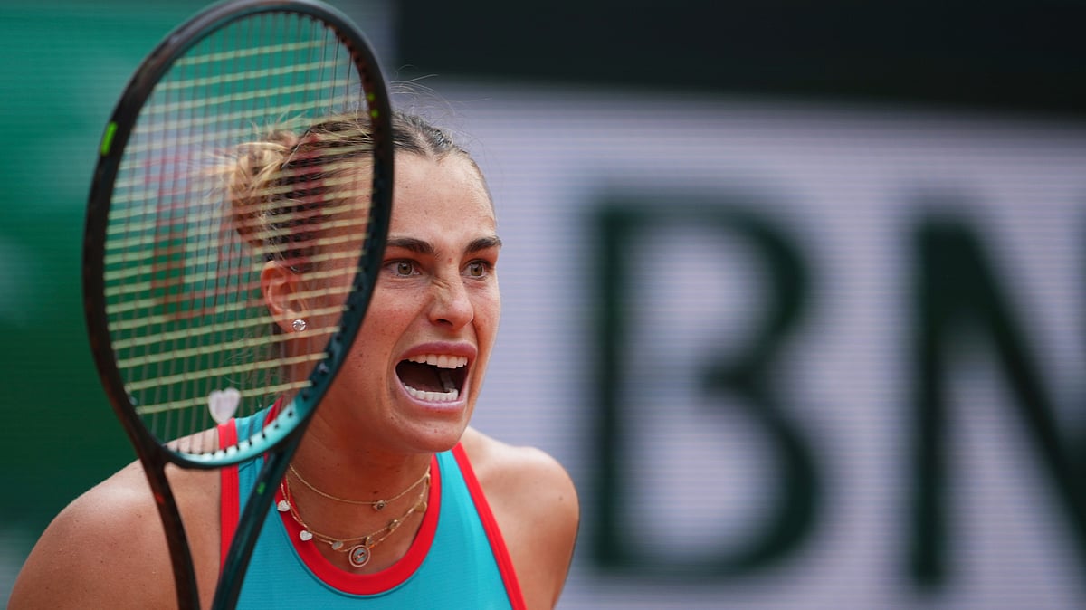 (AP Photo/Lindsey Wasson) : Aryna Sabalenka of Belarus reacts winning a point to Amanda Anisimova of the U.S.during their fourth round match of the French Tennis Open, at the Roland-Garros stadium, in Paris, Sunday, June 1 2025.