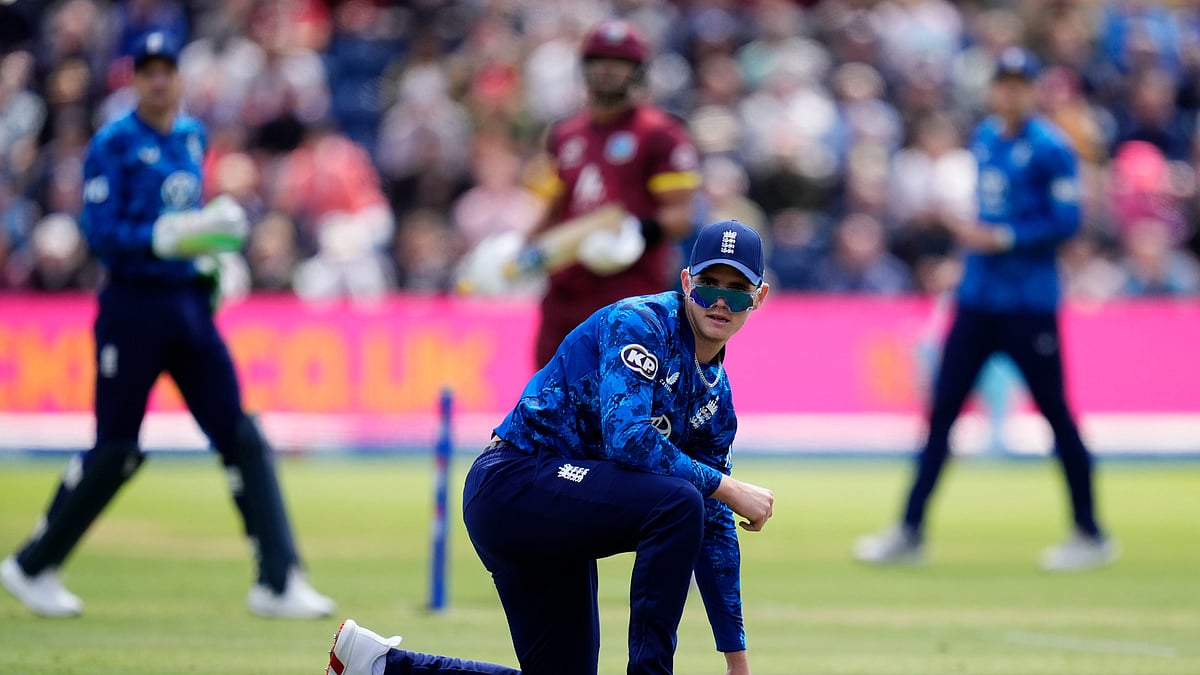 Englands Jacob Bethell watches as a ball passes him while fielding. AP