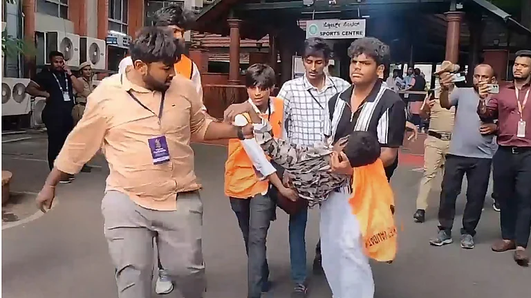 An injured being taken for treatment following chaos near the Chinnaswamy Stadium, after a large number of fans gathered for the felicitation of IPL 2025 winning Royal Challengers Bengaluru team, in Bengaluru, Karnataka - PTI