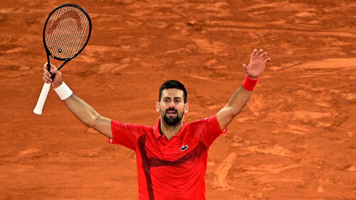 Novak Djokovic celebrates his quarter-final win over Alexander Zverev