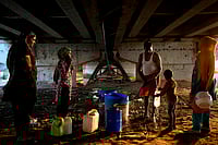 Outlook Photo/ Suresh Pandey : Workers standing on queue to collect water 