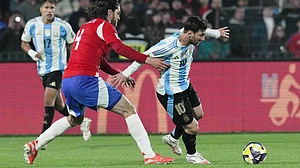 AP/Luis Hidalgo : Argentina's Lionel Messi, right, and Chile's Francisco Sierralta battle for the ball during a qualifying soccer match for the FIFA World Cup 2026 in Santiago, Chile, Thursday, June 5, 2025.