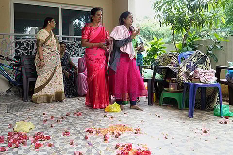 Relatives and friends pay tribute to a victim in Bengaluru