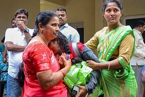 Stadium stampede: Relatives and friends pay tribute to a victim in Bengaluru