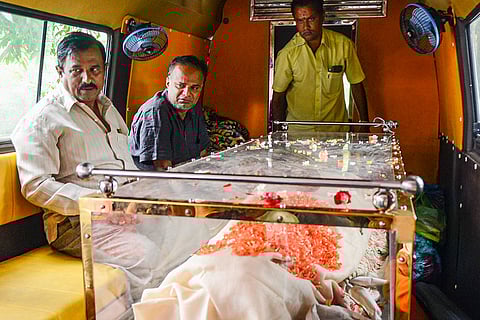 Relatives and friends pay tribute to a victim in Bengaluru