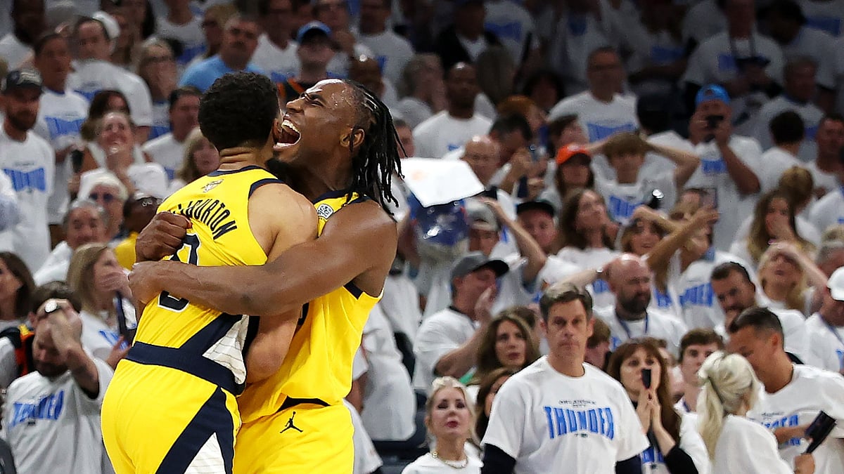 Tyrese Haliburton #0 of the Indiana Pacers congratulated by Aaron Nesmith #23 after scoring a basket against the Oklahoma City Thunder during the fourth quarter in Game One of the 2025 NBA Finals at Paycom Center on June 05, 2025 in Oklahoma City, Oklahoma.
