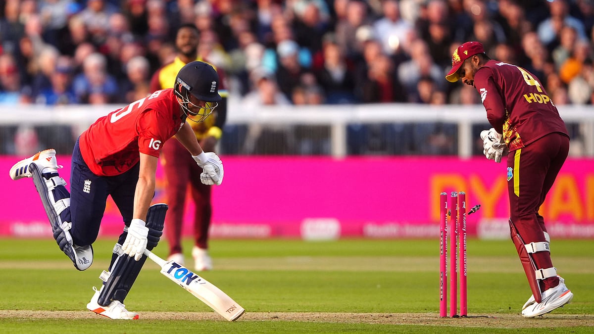 Owen Humphreys/PA via AP : England's Will Jacks is run out during the first men's international Twenty20 match between England and West Indies at Banks Homes Riverside, Chester-le-Street, England.