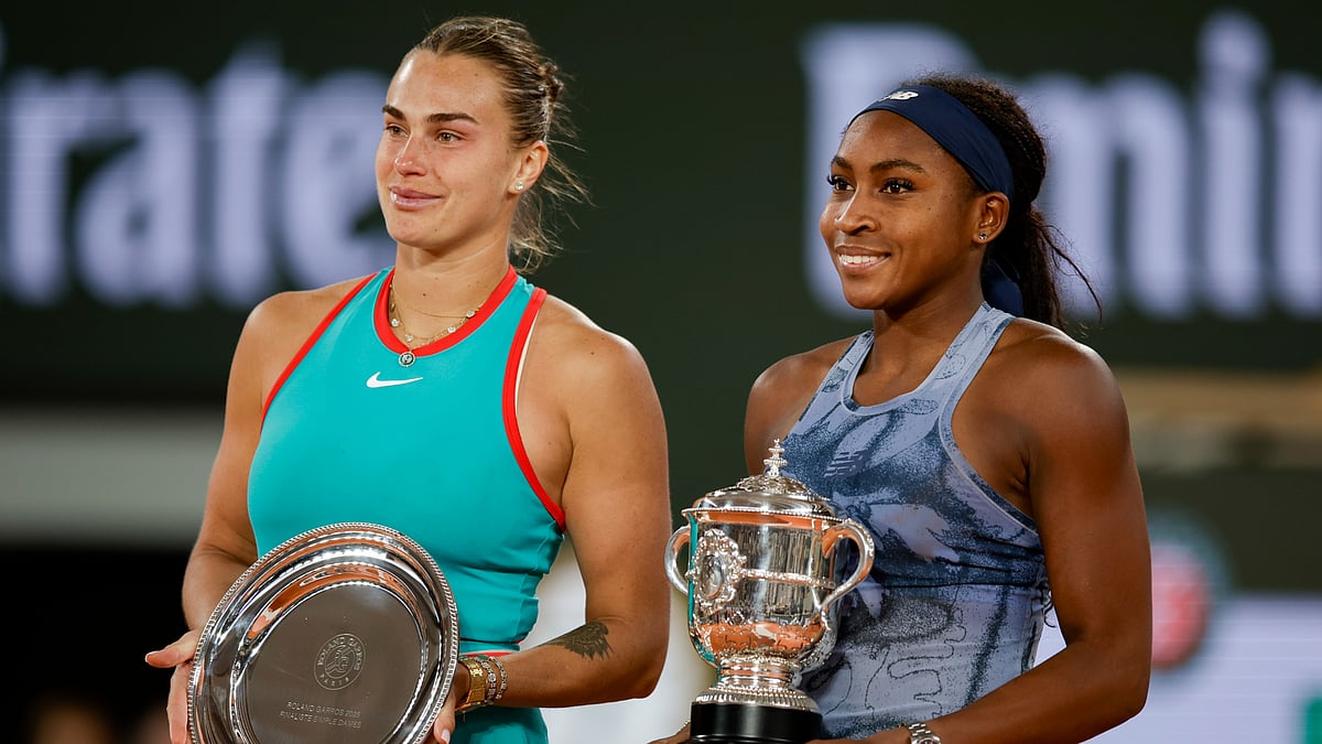 Aryna Sabalenka and Coco Gauff pose for a photo after the French Open final