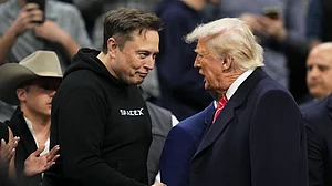 AP : US President Donald Trump with Tesla CEO Elon Musk