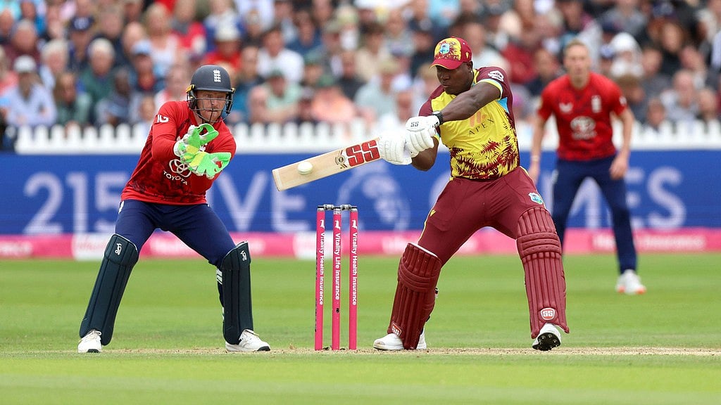 Nigel French/PA via AP : West Indies' Rovman Powell bats during the second Men's International Twenty20 match at the Seat Unique Stadium, in Bristol, England, Sunday June 8, 2025.