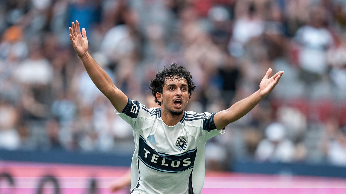 (Ethan Cairns/The Canadian Press via AP)

 : Vancouver Whitecaps' Jeevan Badwal celebrates his goal against the Seattle Sounders during the first half of an MLS soccer match in Vancouver, British Columbia, Sunday, June 8, 2025. 