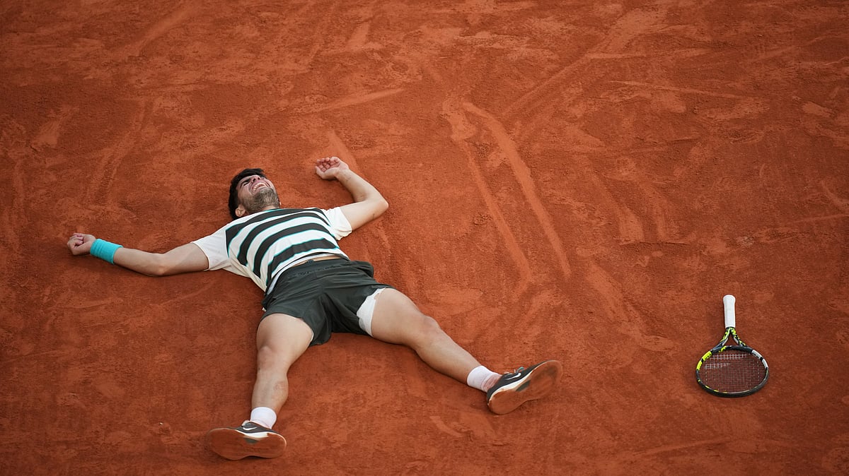 Spain's Carlos Alcaraz reacts after winning the final match of the French Tennis Open at the Roland-Garros against Italy's Jannik Sinner in Paris. - AP Photo/Christophe Ena