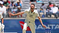  (AP Photo/Trevor Collens, File) : FILE - Australia's Josh Hazlewood, right, reacts after bowling a delivery on the second day of the first cricket test between Australia and India in Perth, Australia, Saturday, Nov. 23, 2024.

